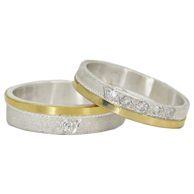 Par de alianzas con piedras oro y plata 925